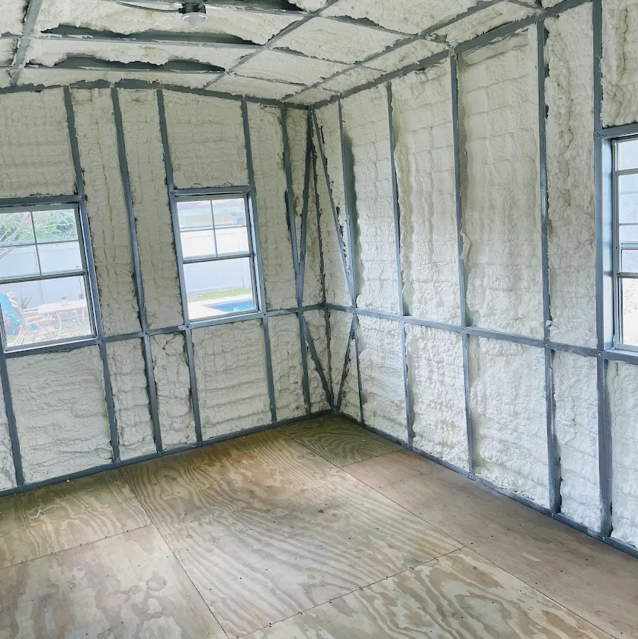 Closed-cell spray foam insulation applied to wall cavities in a residential project in New York